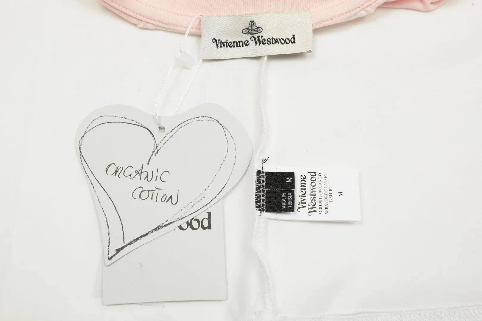 vivienne west wood Vivienne's hand-painted design of Saturn raglan long sleeves. Light pink sleeves with hand-painted Saturn. It really doesn't look too good. The photos are beyond the photos. It is very practical to wear inside and outside. The whole series of correct accessories. Every detail is completely restored. It can be filled directly. Size: S M L Uniform color